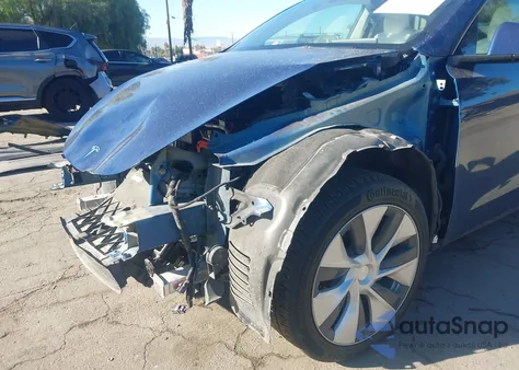 2021 Tesla Model Y Standard Range Rear-Wheel Drive from USA, damaged, VIN 5YJYGDED5MF113905